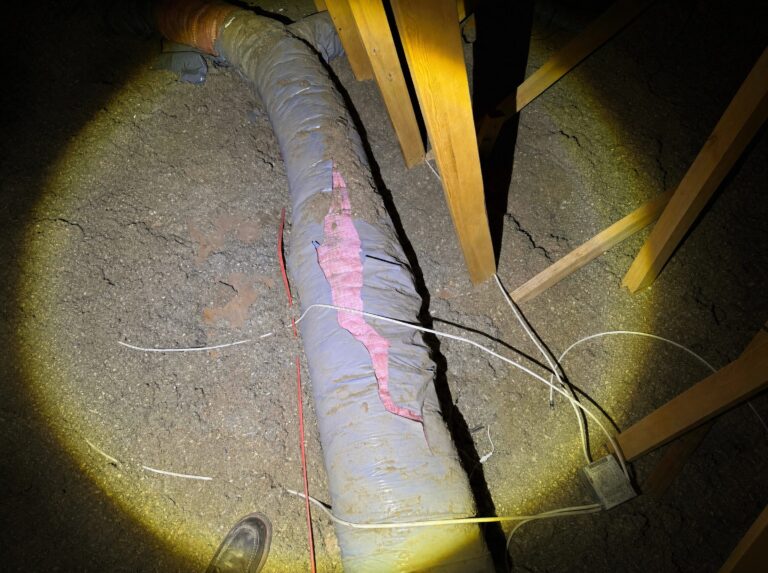 Failed flex duct in a Phoenix attic with the insulation exposed